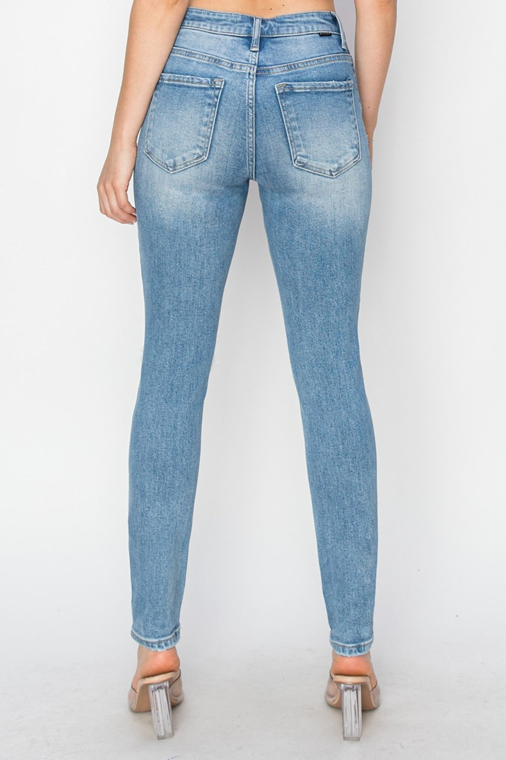 Risen Distressed Skinny Jeans